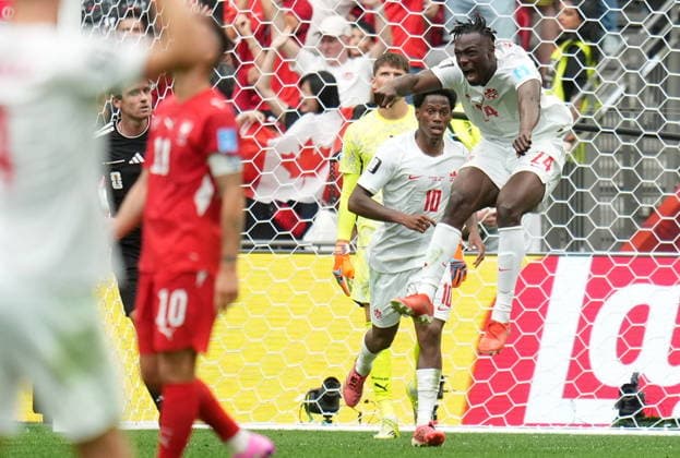 FIFA World Cup, WM, Weltmeisterschaft, Fussball 2026 - Group B - Switzerland vs Canada Promise David of Canada celebrates scoring the 2-1 during the FIFA World Cup 2026 group stage match Switzerland against Canada, in Vancouver, Canada, 24 June 2026. VANCOUVER Canada  Copyright: xBOBxFRIDx