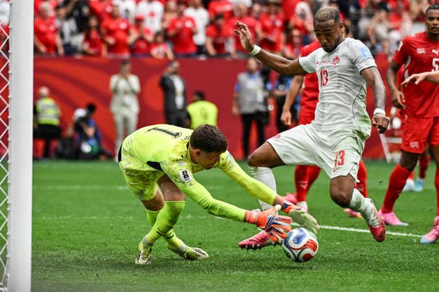 Goalkeeper Gregor Kobel of Switzerland and Derek Cornelius of Canada, Switzerland v Canada, Group B football match of the FIFA World Cup, WM, Weltmeisterschaft, Fussball 2026 at BC Place, Vancouver, Canada on Wednesday 24 June 2026. Photo: Andrew Cornaga Vancouver Canada Copyright: xAndrewxCornaga x