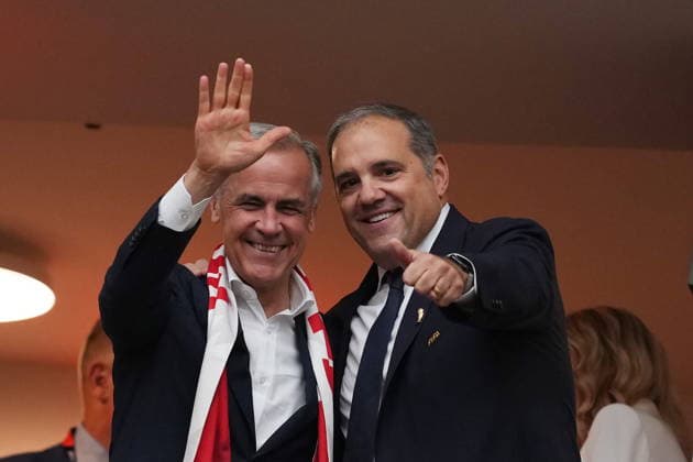 June 24, 2026, Vancouver, Bc, CANADA: Prime Minister Mark Carney cheers with FIFA vice president Victor Montagliani as players enter the field prior to the first half of a World Cup Group B soccer match between Canada and Switzerland, in Vancouver, on Wednesday, June 24, 2026. Canada News - June 24, 2026  - ZUMAc35_ 20260624_zaf_c35_097 Copyright: xEthanxCairnsx