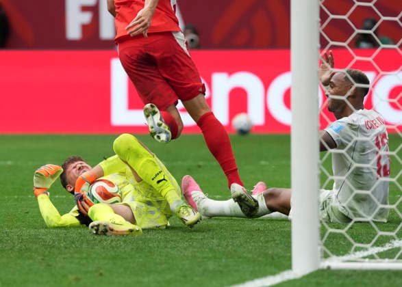 (260625) -- VANCOUVER, June 25, 2026 -- Gregor Kobel (L), goalkeeper of Switzerland falls down during the group B match between Switzerland and Canada at the 2026 FIFA World Cup, WM, Weltmeisterschaft, Fussball at BC Place Vancouver in Vancouver, Canada, June 24, 2026. ) (SP)CANADA-VANCOUVER-FOOTBALL-FIFA WORLD CUP-GROUP B-SUI VS CAN MengxYongmin 