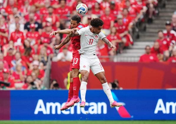 June 24, 2026, Vancouver, Bc, CANADA: Switzerland s Ricardo Rodriguez (13) and Canada s Tajon Buchanan (17) vie for the ball during the first half of a World Cup Group B soccer match, in Vancouver, on Wednesday, June 24, 2026. Canada News - June 24, 2026  - ZUMAc35_ 20260624_zaf_c35_111 Copyright: xDarrylxDyckx