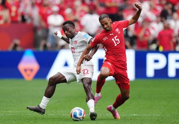 June 24, 2026, Vancouver, Bc, CANADA: Canada s Richie Laryea (22) and Switzerland s Djibril Sow (15) vie for the ball during the first half of a World Cup Group B soccer match, in Vancouver, on Wednesday, June 24, 2026. Canada News - June 24, 2026  - ZUMAc35_ 20260624_zaf_c35_115 Copyright: xDarrylxDyckx