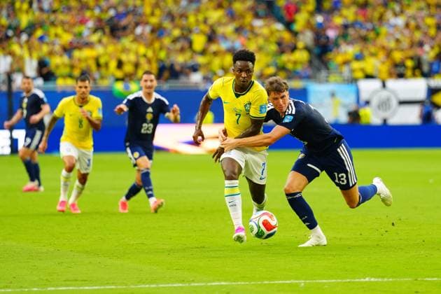 Vinicius Junior of Brazil tackles Jack Hendry of Scotland Scotland v Brazil, 2026 FIFA World Cup, WM, Weltmeisterschaft, Fussball Group C, Football, Miami Stadium, Miami, Florida, USA - 24 Jun 2026Miami Miami Stadium Florida (FL) United States of America EDITORIAL USE ONLY No use with unauthorised audio, video, data, fixture lists, club league logos or live services. Online in-match use limited to 120 images, no video emulation. No use in betting, games or single club league player publications.  Copyright: xJavierxGarcia Shutterstockx 16956030bj