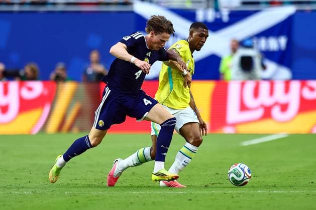 Scott McTominay of Scotland and Rayan of Brazil Scotland v Brazil, 2026 FIFA World Cup, WM, Weltmeisterschaft, Fussball Group C, Football, Miami Stadium, Miami, Florida, USA - 24 Jun 2026Miami Miami Stadium Florida (FL) United States of America EDITORIAL USE ONLY No use with unauthorised audio, video, data, fixture lists, club league logos or live services. Online in-match use limited to 120 images, no video emulation. No use in betting, games or single club league player publications.  Copyright: xMichaelxZemanek Shutterstockx 16956031aw