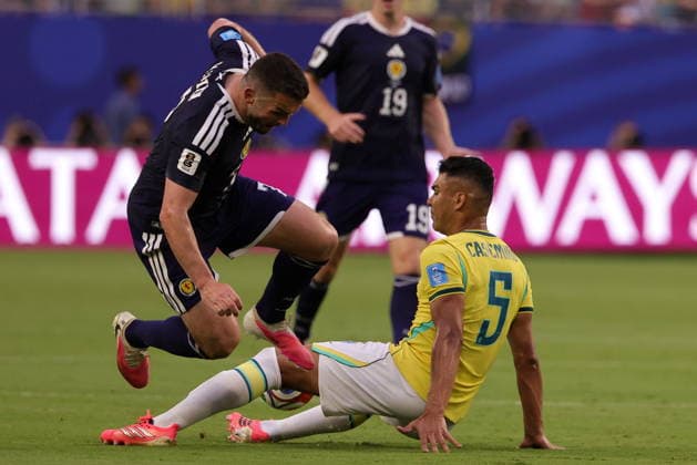 FIFA World Cup, WM, Weltmeisterschaft, Fussball 2026 - Group C - Scotland vs Brazil John McGinn of Scotland (L) in action against Casemiro of Brazil (R) during the FIFA World Cup 2026 group stage match Scotland against Brazil, in Miami, Florida, USA, 24 June 2026. MIAMI United States  Copyright: xCRISTOBALxHERRERA-ULASHKEVICHx