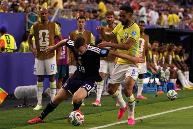 FIFA World Cup, WM, Weltmeisterschaft, Fussball 2026 - Group C - Scotland vs Brazil Lewis Ferguson of Scotland (L) in action against Matheus Cunha of Brazil (R) during the FIFA World Cup 2026 group stage match Scotland against Brazil, in Miami, Florida, USA, 24 June 2026. MIAMI United States  Copyright: xCRISTOBALxHERRERA-ULASHKEVICHx