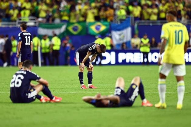 Kieran Tierney and Scotland players dejected at full time Scotland v Brazil, 2026 FIFA World Cup, WM, Weltmeisterschaft, Fussball Group C, Football, Miami Stadium, Miami, Florida, USA - 24 Jun 2026Miami Miami Stadium Florida (FL) United States of America EDITORIAL USE ONLY No use with unauthorised audio, video, data, fixture lists, club league logos or live services. Online in-match use limited to 120 images, no video emulation. No use in betting, games or single club league player publications.  Copyright: xMichaelxZemanek Shutterstockx 16956031cs