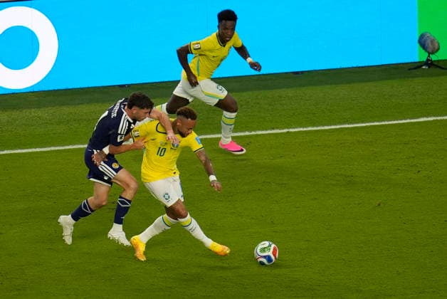 June 24, 2026, Miami Gardens, Florida, USA: Forward Neymar Jr (10) of Brazil drives through the Scotland defense during 2nd half of the World Cup Group C, Round 1 match between Brazil and Scotland at Miami Stadium. Brazil defeated Scotland 3-0. Miami Gardens USA - ZUMAd212 20260624_zsp_d212_040 Copyright: xRichardxDolex