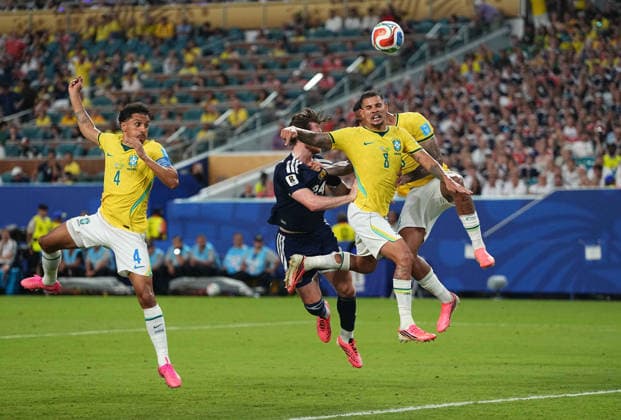 Bruno Guimaraes (Brazil) and Anthony Ralston (Scotland) battle for the ball during Scotland and Brazil, Group L FIFA World Cup, WM, Weltmeisterschaft, Fussball 2026, Miami Stadium, Boston, USA on June 24, 2026. Thor Wegner DeFodi Images. (Photo by DeFodi Images) - *** Bruno Guimaraes of Brazil and Anthony Ralston of Scotland battle for the ball during the Scotland vs. Brazil match in Group L of the 2026 FIFA World Cup at Miami Stadium in Boston, USA, on June 24, 2026. Photo by DeFodi Images (Thor Wegner)