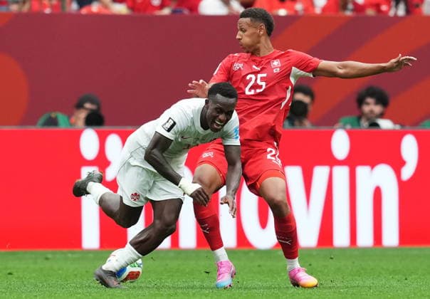 June 24, 2026, Vancouver, Bc, CANADA: Canada s Richie Laryea (22) is tripped up by Switzerland s Luca Jaquez (25) during the second half of a World Cup Group B soccer match, in Vancouver, on Wednesday, June 24, 2026. Canada News - June 24, 2026  - ZUMAc35_ 20260624_zaf_c35_217 Copyright: xEthanxCairnsx