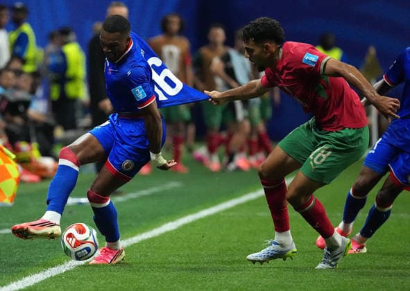 (260625) -- ATLANTA, June 25, 2026 -- Lenny Joseph (L) of Haiti competes with Chadi Riad of Morocco during the group C match between Morocco and Haiti at the 2026 FIFA World Cup, WM, Weltmeisterschaft, Fussball at Atlanta Stadium in Atlanta, the United States, June 24, 2026. ) (SP)U.S.-ATLANTA-FOOTBALL-FIFA WORLD CUP-GROUP C-MAR VS HTI JuxHuanzong 