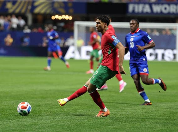 (260625) -- ATLANTA, June 25, 2026 -- Achraf Hakimi (front) of Morocco passes the ball during the group C match between Morocco and Haiti at the 2026 FIFA World Cup, WM, Weltmeisterschaft, Fussball at Atlanta Stadium in Atlanta, the United States, June 24, 2026. ) (SP)U.S.-ATLANTA-FOOTBALL-FIFA WORLD CUP-GROUP C-MAR VS HTI WangxKaiyan 