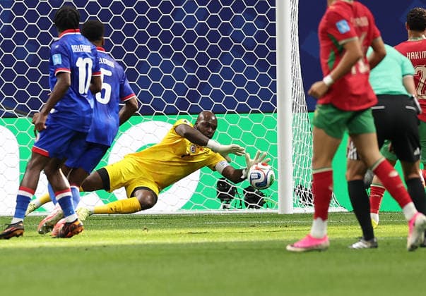 (260625) -- ATLANTA, June 25, 2026 -- Johny Placide (C), goalkeeper of Haiti, saves a ball during the group C match between Morocco and Haiti at the 2026 FIFA World Cup, WM, Weltmeisterschaft, Fussball at Atlanta Stadium in Atlanta, the United States, June 24, 2026. ) (SP)U.S.-ATLANTA-FOOTBALL-FIFA WORLD CUP-GROUP C-MAR VS HTI WangxKaiyan 