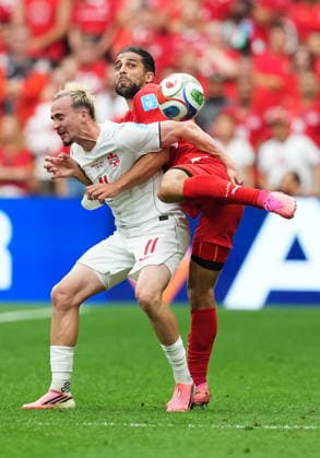 June 24, 2026, Vancouver, Bc, CANADA: Canada s Liam Millar (11) and Switzerland s Ricardo Rodriguez (13) vie for the ball during the second half of a World Cup Group B soccer match, in Vancouver, on Wednesday, June 24, 2026. Canada News - June 24, 2026  - ZUMAc35_ 20260624_zaf_c35_228 Copyright: xEthanxCairnsx