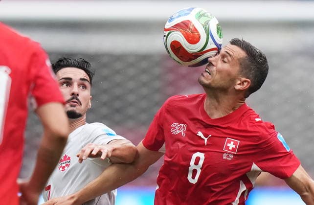 June 24, 2026, Vancouver, Bc, CANADA: Switzerland s Remo Freuler (8) plays the ball in front of Canada s Stephen Eustaquio (7) during the second half of a World Cup Group B soccer match, in Vancouver, on Wednesday, June 24, 2026. Canada News - June 24, 2026  - ZUMAc35_ 20260624_zaf_c35_229 Copyright: xDarrylxDyckx