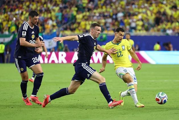 Gabriel Martinelli of Brazil pass the ball under pressure from Lewis Ferguson of Scotland and Scott McKenna of Scotland Scotland v Brazil, 2026 FIFA World Cup, WM, Weltmeisterschaft, Fussball Group C, Football, Miami Stadium, Miami, Florida, USA - 24 Jun 2026Miami Miami Stadium Florida (FL) United States of America EDITORIAL USE ONLY No use with unauthorised audio, video, data, fixture lists, club league logos or live services. Online in-match use limited to 120 images, no video emulation. No use in betting, games or single club league player publications.  Copyright: xMichaelxZemanek Shutterstockx 16956031ep