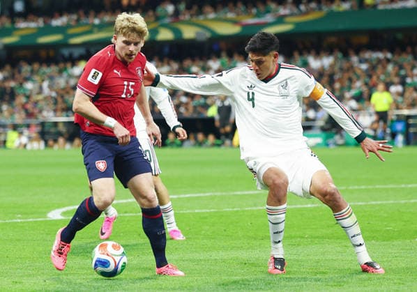 Czechia s Pavel Sulc (15) and Mexico s Edson Alvarez fight for the ball in the second half of a FIFA World Cup, WM, Weltmeisterschaft, Fussball match at Mexico City Stadium in Mexico City, Mexico, on Wednesday, June 24, 2026. Mexico defeated Czechia 3-0.  MEX20260624829 CHRISTIANxBRUNSKILL
