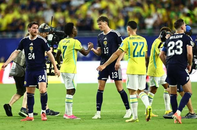 Jack Hendry of Scotland shakes hands Vinicius Junior of Brazil after the match Scotland v Brazil, 2026 FIFA World Cup, WM, Weltmeisterschaft, Fussball Group C, Football, Miami Stadium, Miami, Florida, USA - 24 Jun 2026Miami Miami Stadium Florida (FL) United States of America EDITORIAL USE ONLY No use with unauthorised audio, video, data, fixture lists, club league logos or live services. Online in-match use limited to 120 images, no video emulation. No use in betting, games or single club league player publications.  Copyright: xMichaelxZemanek Shutterstockx 16956031hi