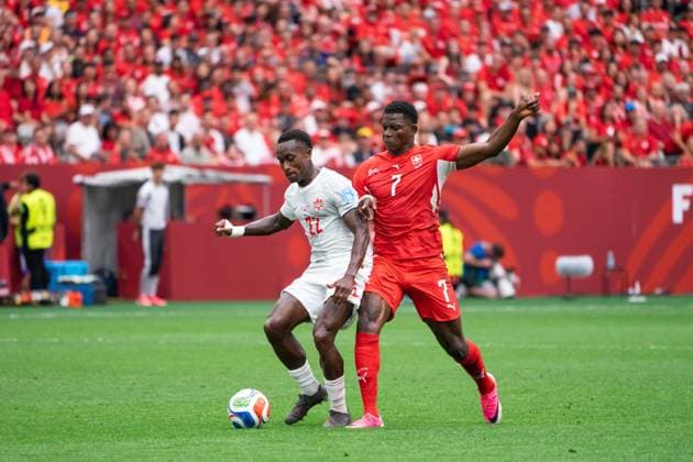 VANCOUVER, CANADA - JUNE 24: Richie Laryea of Canada and Breel Embolo of Switzerland battles for the ball during the FIFA World Cup, WM, Weltmeisterschaft, Fussball 2026 group stage match between Canada and Switzerland at BC Place Vancouver Stadium on June 24, 2026 in Vancouver, British Columbia, Canada.  Copyright: xAmyxElle SPPx Sportspressphoto_SPR176201