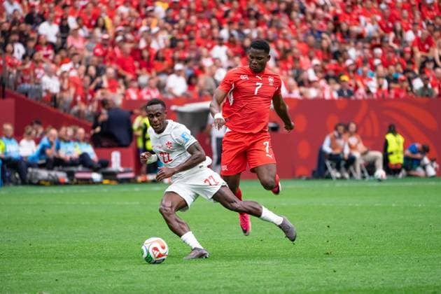 VANCOUVER, CANADA - JUNE 24: Richie Laryea of Canada and Breel Embolo of Switzerland battles for the ball during the FIFA World Cup, WM, Weltmeisterschaft, Fussball 2026 group stage match between Canada and Switzerland at BC Place Vancouver Stadium on June 24, 2026 in Vancouver, British Columbia, Canada.  Copyright: xAmyxElle SPPx Sportspressphoto_SPR176203