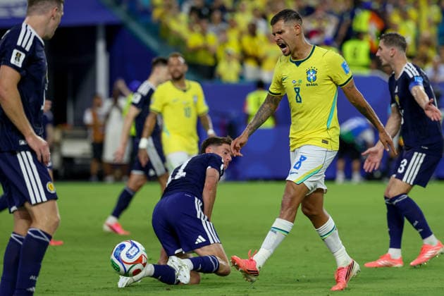 MIAMI GARDENS, FL - JUNE 24: Bruno Guimaraes 8 of Brazil kicks a ball as Ryan Christie 11 of Scotland attempts to block during a FIFA World Cup, WM, Weltmeisterschaft, Fussball 2026 Group C match between Scotland and Brazil on June 24,2026 at Miami Stadium, in Miami Gardens, Fla.(Photo by Chris Arjoon Icon Sportswire) SOCCER: JUN 24 FIFA World Cup 26 Group C - Scotland vs Brazil EDITORIAL USE ONLY Icon26062400100062