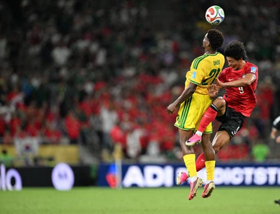 (260625) -- MONTERREY, June 25, 2026 -- Ime Okon (L) of South Africa and Cho Gue-sung of South Korea fights for a headball during a group A match between South Africa and South Korea at the 2026 FIFA World Cup, WM, Weltmeisterschaft, Fussball at Estadio Monterrey in Monterrey, Mexico, on June 24, 2026. ) (SP)MEXICO-MONTERREY-FOOTBALL-FIFA WORLD CUP-GROUP A-RSA VS KOR WuxWei 