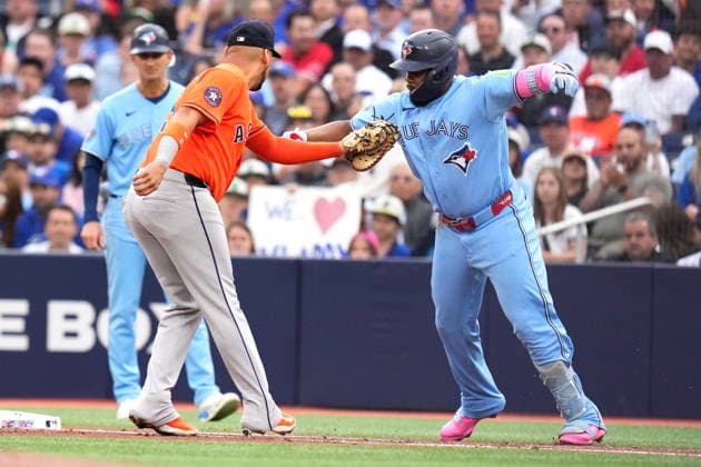 June 24, 2026, Toronto, On, CAN: Toronto Blue Jays Vladimir Guerrero Jr. (27) is tagged out at first base by Houston Astros first baseman Isaac Paredes (15) during first inning MLB, Baseball Herren, USA baseball action in Toronto on Wednesday, June 24, 2026. Canada News - June 24, 2026  - ZUMAc35_ 20260624_zaf_c35_308 Copyright: xChrisxYoungx