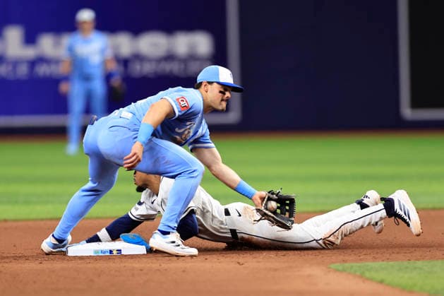 June 24, 2026, St. Petersburg, Florida, USA: Tampa Bay Rays left fielder Chandler Simpson (14) safely steals second base before Kansas City Royals second baseman Michael Massey (19) can tag him during an MLB, Baseball Herren, USA game on June 24, 2026 at Tropicana Field. The Rays beat the Royals 5-3. MLB 2026: Tampa Bay Rays 5 : 3 Kansas City Royals  - ZUMAh180 20260624_zsp_h180_077 Copyright: xKimxHukarix