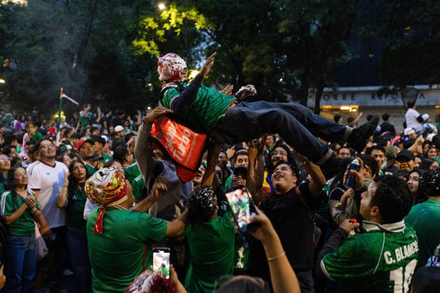 June 24, 2026, Mexico City, Mexico: Supporters of the Mexican national team, Nationalteam gathered around the Angel of Independence in Mexico City to watch the 2026 FIFA World Cup, WM, Weltmeisterschaft, Fussball match between Mexico and Czechia on a giant screen. At the same time, relatives of missing persons and search collectives held a soccer match for memory and against forgetting at the Roundabout of the Disappeared to raise awareness about the crisis of missing persons in Mexico. Mexico City Mexico - ZUMAl178 0859970506st Copyright: xCristianxLeyvax