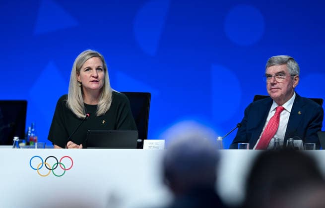 (260625) -- LAUSANNE, June 25, 2026 -- IOC President Kirsty Coventry (L) speaks during the 146th International Olympic Committee (IOC) Session in Lausanne, Switzerland, June 24, 2026. ) (SP)SWITZERLAND-LAUSANNE-146TH IOC SESSION LianxYi 
