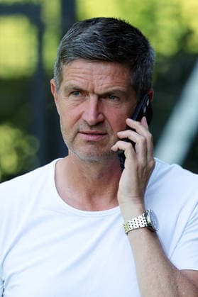 24.06.2026, xrekx, Fussball 2.Bundesliga, VfL Wolfsburg - Trainingsstart Saison 2026 27 v.l. Ralf Becker Sportdirektor (Hannover 96) Handy, Smartphone (DFL DFB REGULATIONS PROHIBIT ANY USE OF PHOTOGRAPHS as IMAGE SEQUENCES and or QUASI-VIDEO) Wolfsburg *** June 24, 2026, xrekx, Soccer, 2. Bundesliga, VfL Wolfsburg Starts Training for the 2026–27 Season; Ralf Becker, Sports Director of Hannover 96, Cell Phone, Smartphone; DFL and DFB regulations prohibit any use of photographs as image sequences and or quasi-video; Wolfsburg