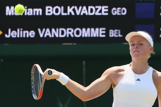 Belgian Jeline Vandromme pictured in action during a tennis match against Georgian Bolkvadze, a qualifier for the women s singles at the Wimbledon grand slam tennis tournament in London, Britain, Thursday 25 June 2026. The main tournament is starting next Monday. BENOITxDOPPAGNE  x179236334x