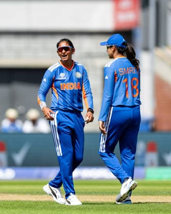 MANCHESTER, ENGLAND - JUNE 25: Harmanpreet Kaur and Smriti Mandhana of India look on during the ICC Women s T20 World Cup match between India and Bangladesh at Old Trafford Cricket Ground on June 25, 2026 in Manchester, England.  Copyright: xUnnatixNaidux Sportspressphoto_SPR176461