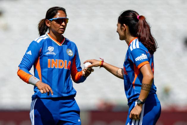 MANCHESTER, ENGLAND - JUNE 25: Harmanpreet Kaur and Renuka Singh Thakur of India are seen during the ICC Women s T20 World Cup match between India and Bangladesh at Old Trafford Cricket Ground on June 25, 2026 in Manchester, England.  Copyright: xUnnatixNaidux Sportspressphoto_SPR176476