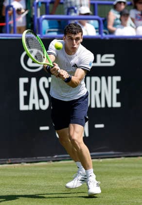 RECORD DATE NOT STATED 25th June 2026; Devonshire Park Lawn Tennis Club, Eastbourne, East Sussex, England; Lexus Eastbourne Open Tennis, Day Five; Juan Manuel Cerundoli (ARG) plays a backhand shot against Toby Samuel (GBR) HongboxChen