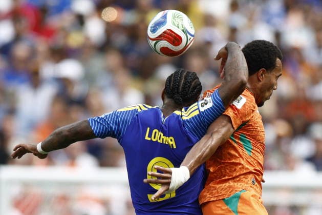 FIFA World Cup, WM, Weltmeisterschaft, Fussball 2026 - Group E - Curacao vs Ivory Coast Jurgen Locadia of Curacao (L) in action against Guela Doue of Ivory Coast (R) during the FIFA World Cup 2026 group stage match Curacao against Ivory Coast, in Philadelphia, Pennsylvania, USA, 25 June 2026. PHILADELPHIA United States  Copyright: xWILLxOLIVERx