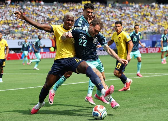 (260626) -- NEW JERSEY, June 26, 2026 -- David Raum (front R) of Germany competes during the group E match between Ecuador and Germany at the 2026 FIFA World Cup, WM, Weltmeisterschaft, Fussball at New York New Jersey Stadium in New Jersey, the United States, June 25, 2026. ) (SP)U.S.-NEW JERSEY-FOOTBALL-FIFA WORLD CUP-GROUP E-ECU VS GER CaoxCan 
