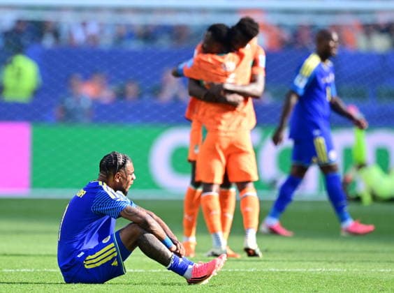 Curacao v Ivory Coast - FIFA World Cup, WM, Weltmeisterschaft, Fussball 2026 - Group E PHILADELPHIA, USA - JUNE 25: Juninho Bacuna of Curacao reacts as players of Ivory Coast celebrate after the 2026 FIFA World Cup First Stage Group E match between Curacao and Ivory Coast at Lincoln Financial Field (Philadelphia Stadium) in Philadelphia, Pennsylvania, United States on June 25, 2026. Abdulhamid Hosbas Anadolu Pennsylvania United States. Editorial use only. Please get in touch for any other usage.  Copyright: x2026xAnadoluxAbdulhamidxHosbasx
