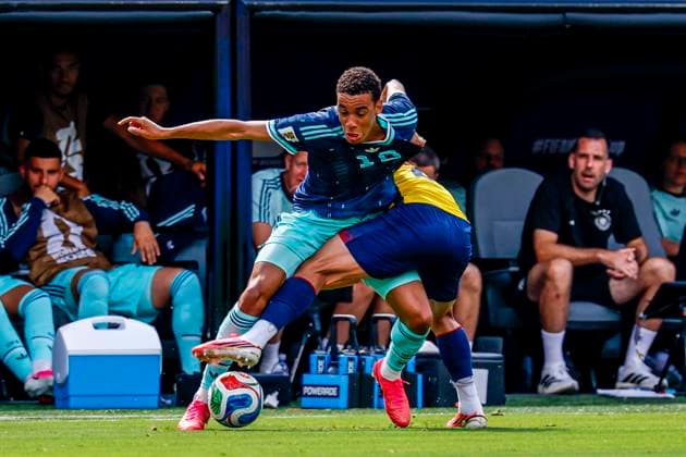 Jamal Musiala of Germany battle for the ball , Group E - FIFA World Cup, WM, Weltmeisterschaft, Fussball 2026, Ecuador v Germany, New York New Jersey Stadium, June 25, 2026, East Rutherford, United States.
