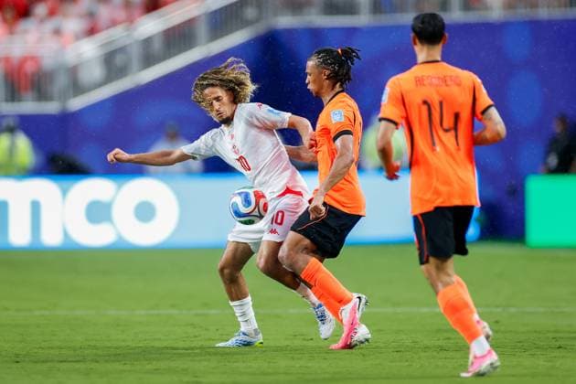 KANSAS CITY, 25-06-2026, Kansas City Stadium, World Cup 2026 Match between Tunesia and The Netherlands. Picture Shows Netherlands player Nathan Ake and Tunisia player Hannibal Mejbri Tunesia - Netherlands (World Cup 2026)  x204648615x Copyright: