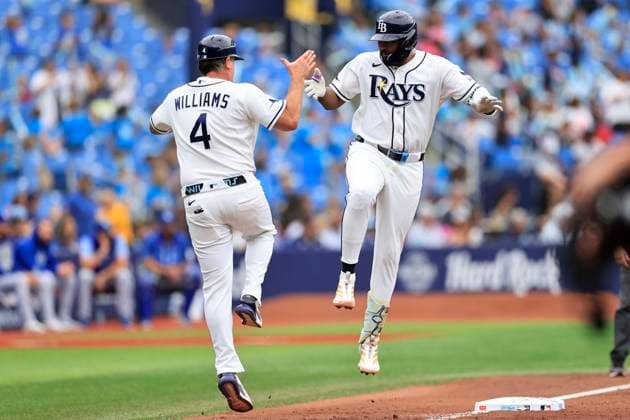 June 25, 2026, St. Petersburg, Florida, USA: Tampa Bay Rays third baseman Junior Caminero (13) is congratulated by third base coach Brady Williams (4) after hitting his second home run to left field during an MLB, Baseball Herren, USA game against the Kansas City Royals on June 25, 2026 at Tropicana Field. The Rays beat the Royals 13-2. MLB 2026: Tampa Bay Rays 13 : 2 Kansas City Royals  - ZUMAh180 20260625_zsp_h180_077 Copyright: xKimxHukarix