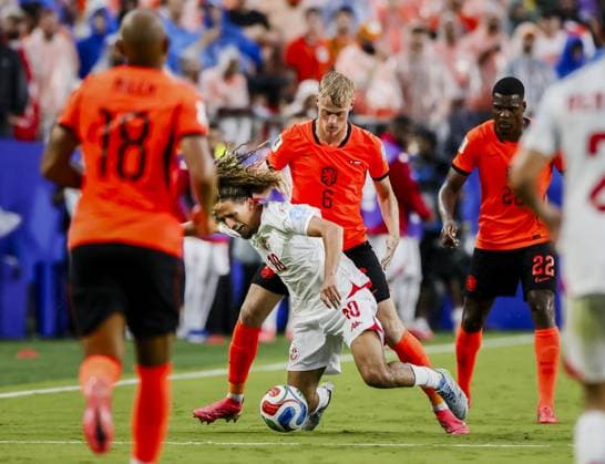KANSAS - Hannibal Mejbri of Tunisia and Jan Paul van Hecke of the Netherlands during the FIFA World Cup, WM, Weltmeisterschaft, Fussball 2026 Group F match between Tunisia and the Netherlands at Kansas City Stadium on June 25, 2026, in Kansas, United States. KOEN VAN WEEL ANP FIFA World Cup 2026 group stage 2026 xVIxANPxSportx xxANPxIVx 561997808 originalFilename: 561997808.jpg