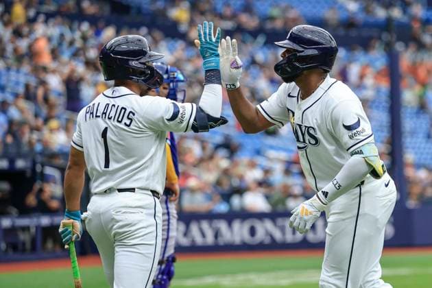 June 25, 2026, St. Petersburg, Florida, USA: Tampa Bay Rays third baseman Junior Caminero (13) gets a high five from second baseman Richie Palacios (1) after hitting his second home run during an MLB, Baseball Herren, USA game against the Kansas City Royals on June 25, 2026 at Tropicana Field. The Rays beat the Royals 13-2. St. Petersburg USA - ZUMAh180 20260625_zsp_h180_063 Copyright: xKimxHukarix