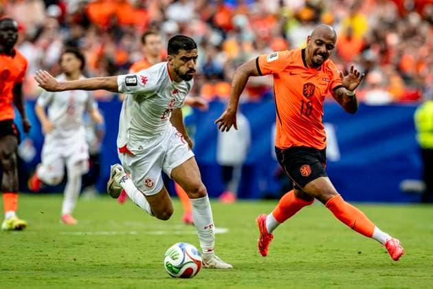 KANSAS CITY - (lr) Mohamed Amine Ben Hmida of Tunisia and Donyell Malen of the Netherlands during the 2026 World Cup at Arrowhead Stadium on June 25, 2026, in Kansas City, United States. (Photo by Stefan Koops EYE4IMAGES DeFodi Images) - *** KANSAS CITY — Mohamed Amine Ben Hmida of Tunisia and Donyell Malen of the Netherlands during the 2026 World Cup at Arrowhead Stadium on June 25, 2026, in Kansas City, United States. Photo by Stefan Koops, EYE4IMAGES, DeFodi Images