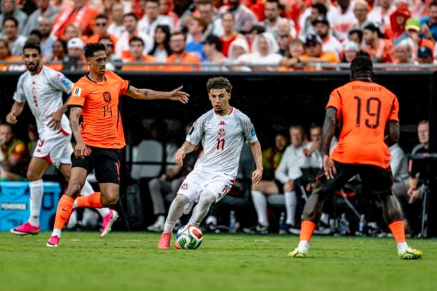 KANSAS CITY - (l-r) Tijjani Reijnders of the Netherlands, Ismael Gharbi of Tunisia during the 2026 World Cup at Arrowhead Stadium on June 25, 2026 in Kansas City United States. (Photo by Stefan Koops EYE4IMAGES DeFodi Images) - *** KANSAS CITY l Tijjani Reijnders of the Netherlands and Ismael Gharbi of Tunisia during the 2026 World Cup at Arrowhead Stadium on June 25, 2026, in Kansas City, United States. Photo by Stefan Koops, EYE4IMAGES, DeFodi Images