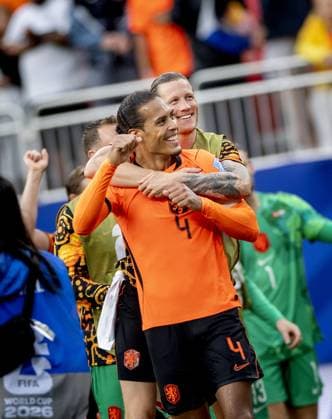 KANSAS - (lr) Virgil van Dijk of the Netherlands and Wout Weghorst of the Netherlands celebrate the victory over Tunisia after the 2026 FIFA World Cup, WM, Weltmeisterschaft, Fussball Group F match between Tunisia and the Netherlands at Kansas City Stadium on June 25, 2026, in Kansas, United States. KOEN VAN WEEL ANP FIFA World Cup 2026 group stage 2026 xVIxANPxSportx xxANPxIVx 562005946 originalFilename: 562005946.jpg