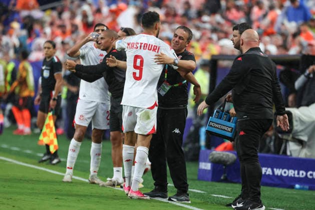 KANSAS CITY, MO - JUNE 25: Hazem Mastouri 9 of Tunisia gets a hug from the staff after scoring a goal in the second half of the FIFA World Cup, WM, Weltmeisterschaft, Fussball 2026 Group F match between Tunisia and Netherlands on June 25, 2026 at Kansas City Stadium in Kansas City, MO. (Photo by Scott Winters Icon Sportswire) SOCCER: JUN 25 FIFA World Cup 26 Group F - Tunisia vs Netherlands EDITORIAL USE ONLY Icon2606250560