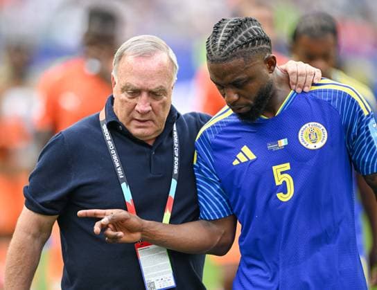 June 25, 2026, Philadelphia, Pennsylvania, United States: Curacao DICK ADVOCAAT walks off the pitchwhile talking with his player, SHEREL FLORANUS (5) during the Group E World Cup match at Philadelphia Stadium World Cup 2026: Group E: Ivory Coast 2:0 Curacao  - ZUMArf1_ 20260625_spo_rf1_319 Copyright: xRickyxFitchettx