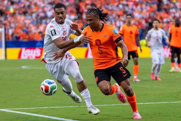 KANSAS CITY, MO - JUNE 25: Nathan AkÃ 5 of the Netherlands and Yan Valery 20 of Tunisia battle for a loose ball during the FIFA World Cup, WM, Weltmeisterschaft, Fussball 2026 Group F match between Tunisia and the Netherlands on June 25, 2026 at the Kansas City Stadium in Kansas City, MO. (Photo by Nick Tre. Smith Icon Sportswire) SOCCER: JUN 25 FIFA World Cup 26 Group F - Tunisia vs Netherlands EDITORIAL USE ONLY Icon2606253170