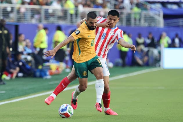 Aziz Behich of Australia and Diego Gomez of Paraguay challenge for the ball during the FIFA World Cup, WM, Weltmeisterschaft, Fussball 2026 match between Paraguay and Australia at Levi s Stadium, San Francisco, USA on 26 June 2026. Copyright: xPeterxDovganx 45120035